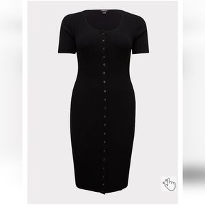 Black, stretchy, body con with snaps